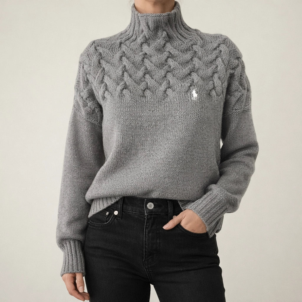 Pull noir à col montant en maille torsadée