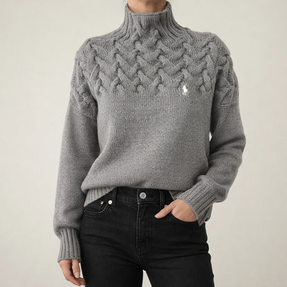 Pull noir à col montant en maille torsadée