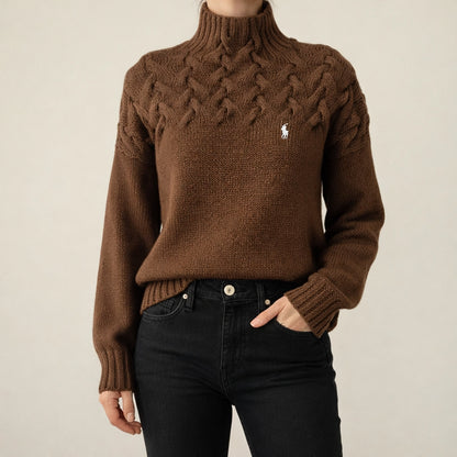 Pull noir à col montant en maille torsadée